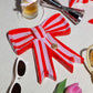Mbajtese bizhush "Red Bow"