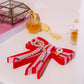 Mbajtese bizhush "Red Bow"