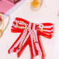 Mbajtese bizhush "Red Bow"