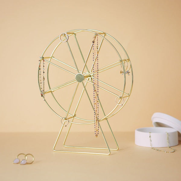 Mbajtese Bizhush Golden Wheel